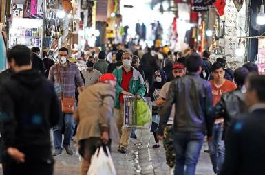People walk in Bazaar in Tehran, Iran's capital. FILE