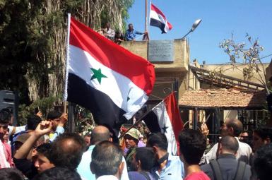 برافراشتن دوباره پرچم سوریه در شهر درعا