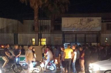 People gathered outside the electricity company in northern Iran. July 4, 2021