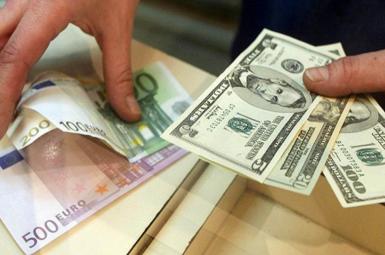 Dollar and euro notes in a money exchange bureau in Tehran. FILE