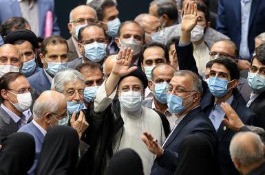 Iran's Ebrahim Raisi with hardline supporters during his inauguration. August 5, 2021