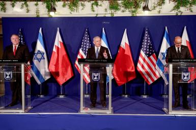 Former US Secretary of State Mike Pompeo, Israeli Prime Minister Benjamin Netanyahu and Bahrain's Foreign Minister Abdullatif Al Zayani deliver joint statements during a meeting in Jerusalem November 18, 2020.