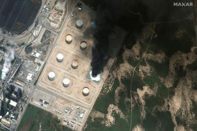 A satellite view shows a closer view of burning storage tank in southern Israel May 12, 2021.