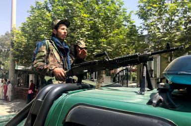 Taliban gunmen patrolling the streets of Kabul. August 16. 2021 