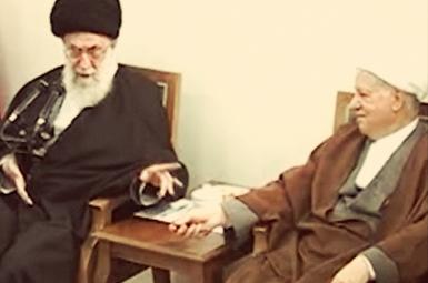 Screen grab from a 2012 video showing Khamenei and Rafsanjani in a debate over relations with the US.