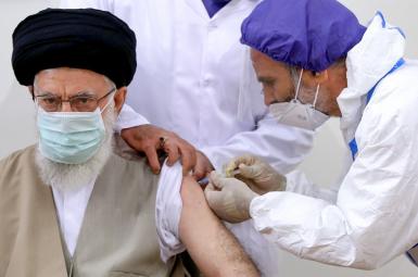 Ali Khamenei receiving what is said to be Iran's first homegrown COVID vaccine. June 25, 2021