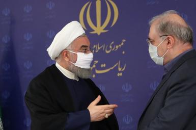 President Hassan Rouhani (L) and Health Minister Saeed Namaki. Undated