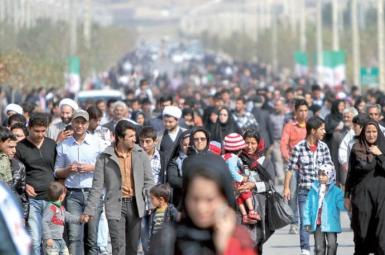 General view of people walking in a Tehran street. Undated
