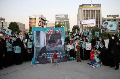 A rally in Tehran for Ebrahim Raeesi, with banner showing him with Qasem Soleimani. June 14, 2021