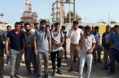 Refinery workers on strike in southern Iran. June 27, 2021