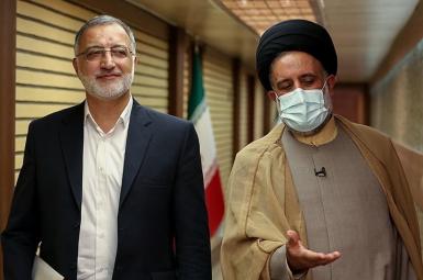 Hardliner Iran presidential candidate Alireza Zakani (L) Walking to first debate. June 5, 2021