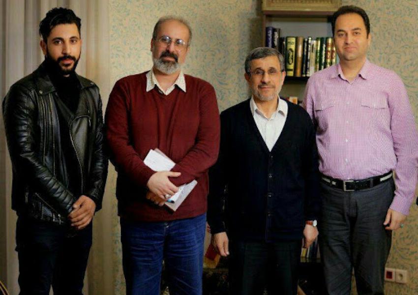 Ahmadinejad with aides, with Abdolreza Davari to his right. FILE