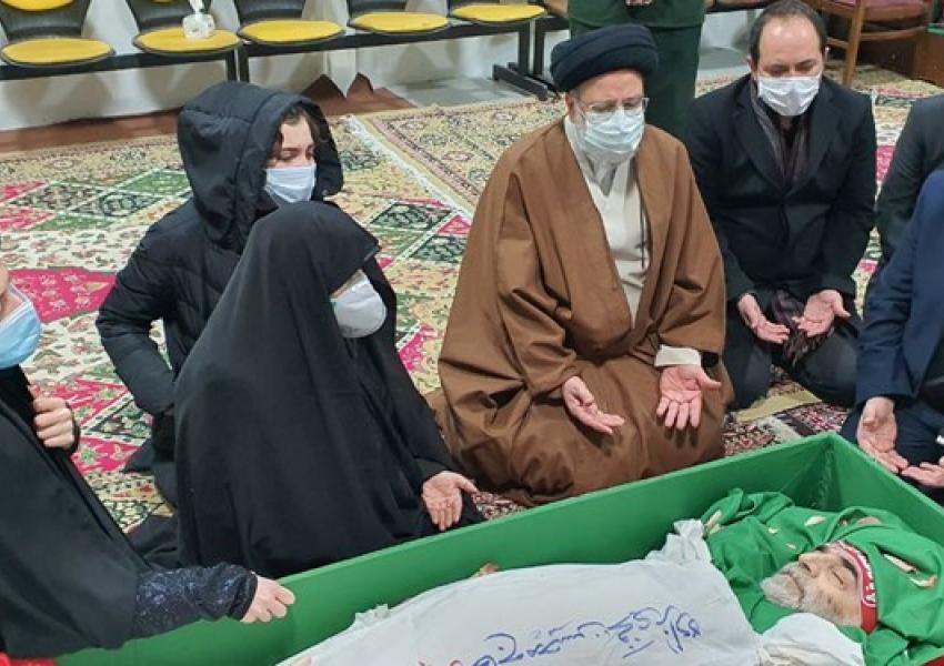 The body of Mohsen Fakhrizadeh surrounded by family members and Ayatollah Ebrahim Raeesi. November 28, 2020