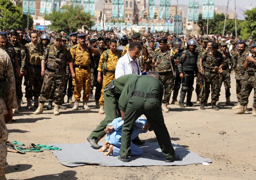 Houthis prepare a man to be executed at Tahrir Square in Sanaa, Yemen September 18, 2021.