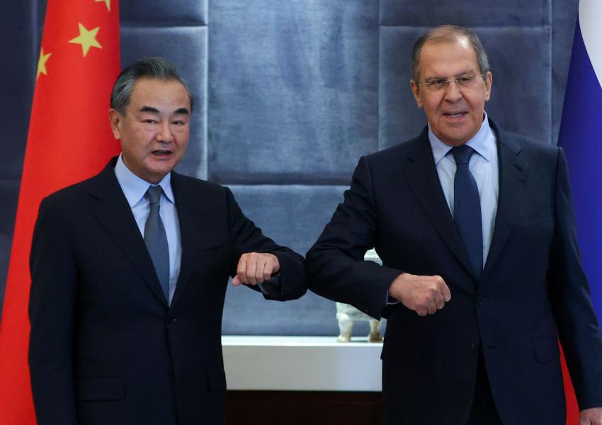 Russian Foreign Minister Sergei Lavrov meets with Chinese Foreign Minister Wang Yi on the sidelines of the Shanghai Cooperation Organization (SCO) summit in Tajikistan September 16, 2021. 