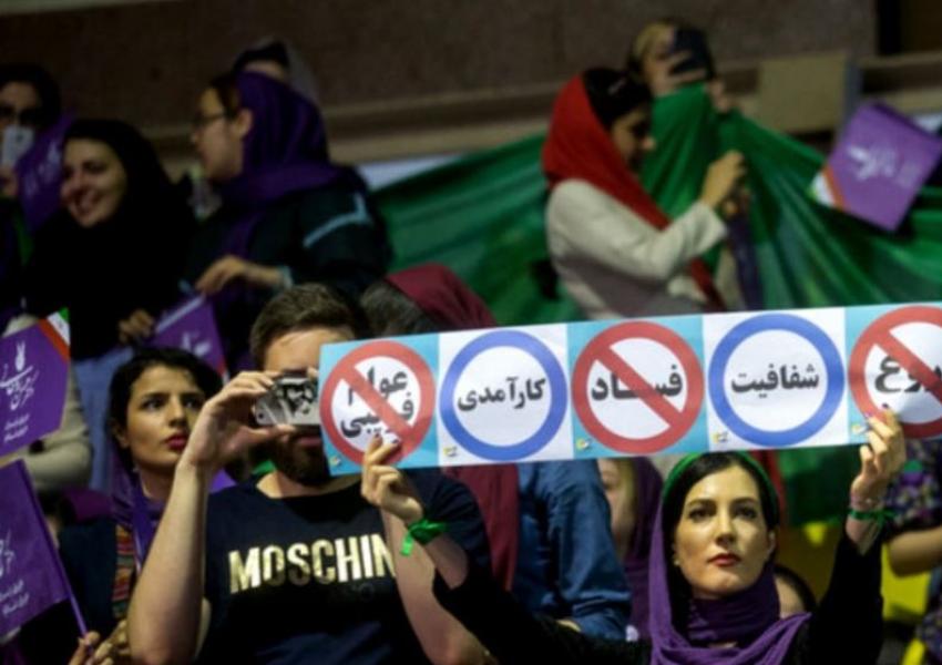 Young Iranians campaigning for Hassan Rouhani as a reform leader in May 2017