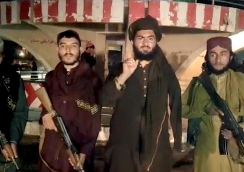 Taliban fighters pose for a photo on August 10, 2021